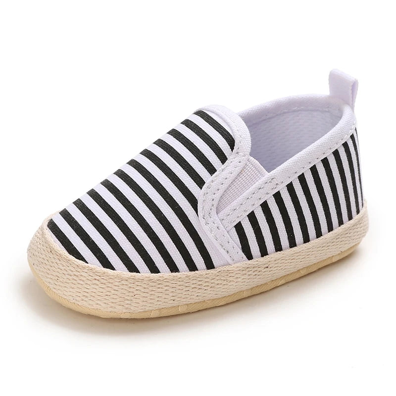 Black and white striped shoe on a white background